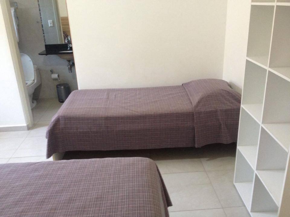 Pousada Parque Suites Estacionamento E Piscina Гуаружа Номер фото